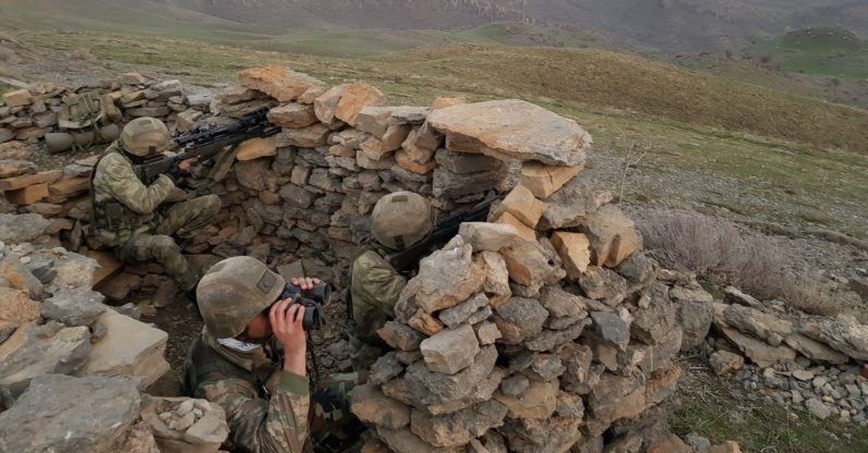 In this undated photo, Turkish soldiers participate in a counterterrorism operation near the Iraqi border in the Çukurca district, Hakkari province, Turkey. (AA File Photo)