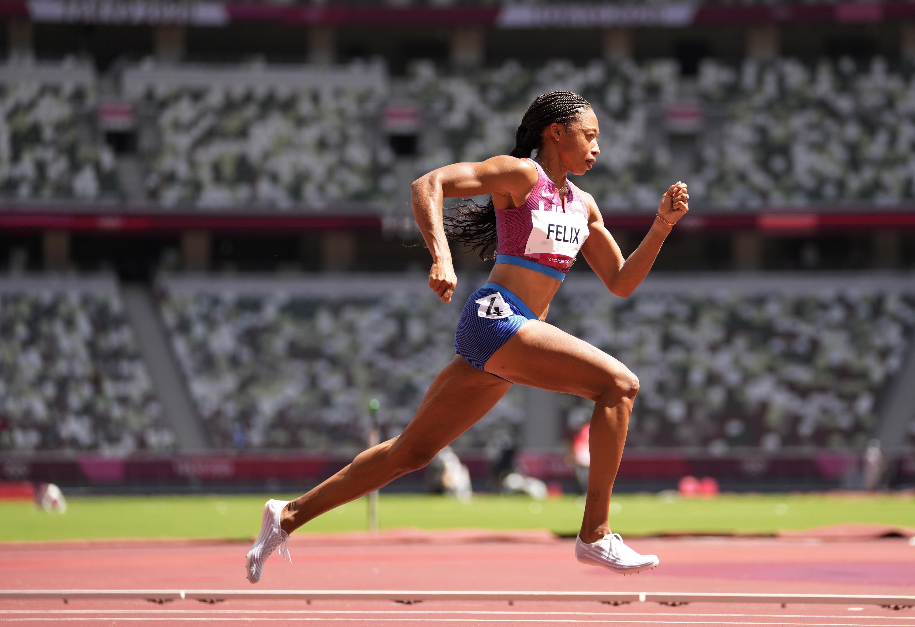 Allyson Felix of the United States races in a women's 400-meter heat at the 2020 Summer Olympics, Tokyo, Japan, Aug. 3, 2021. (AP Photo)