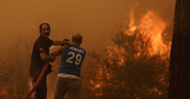 Firefighters battle flames in Manavgat, Antalya, southern Turkey, Aug. 3, 2021. (AA PHOTO) 
