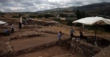 An archaeological team works on the historical remains of the ancient city of Comana Pontica, in Tokat, Turkey, Aug. 2, 2021. (AA Photo)