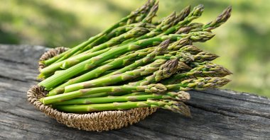 Green asparagus in a basket. (Shutterstock Photo)