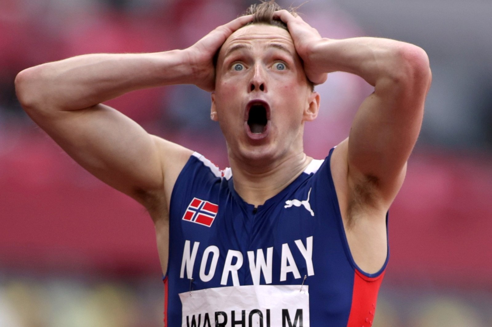 Karsten Warholm of Norway celebrates after winning 400-meter hurdles gold at the Tokyo 2020 Olympics, Tokyo, Japan, Aug. 3, 2021. (Reuters Photo) 
