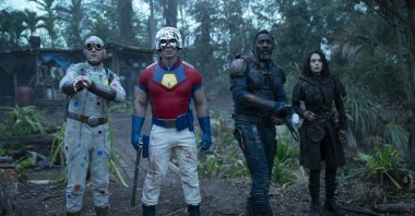 David Dastmalchian (L), John Cena (C-L), Idris Elba (C-R) and Daniela Melchior look off camera in a scene from the film "The Suicide Squad." (Warner Bros. via AP)