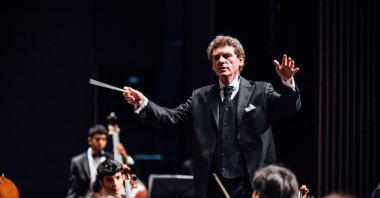 Cem Mansur will conduct the Turkish National Youth Philharmonic Orchestra at the 7th Ayvalık Music Festival. (İHA Photo)