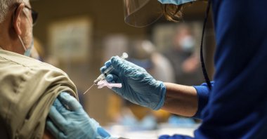 Tyson Foods team members receive COVID-19 vaccines from health officials at the facility in Wilkesboro, N.C., U.S., Feb. 2, 2021. (AP)