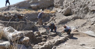 Members of the excavation team carry out archaeological work at the Çadır Mound site in the Peyniryemez village, in the Sorgun district of Yozgat, Tureky, Aug. 3, 2021. (AA Photo)