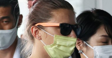 Belarusian Sprinter Krystsina Tsimanouskaya, who took refuge in the Polish embassy in Tokyo, arrives at Narita International Airport to leave for Vienna, in Narita, Tokyo, Japan, Aug. 4, 2021. (AFP Photo)