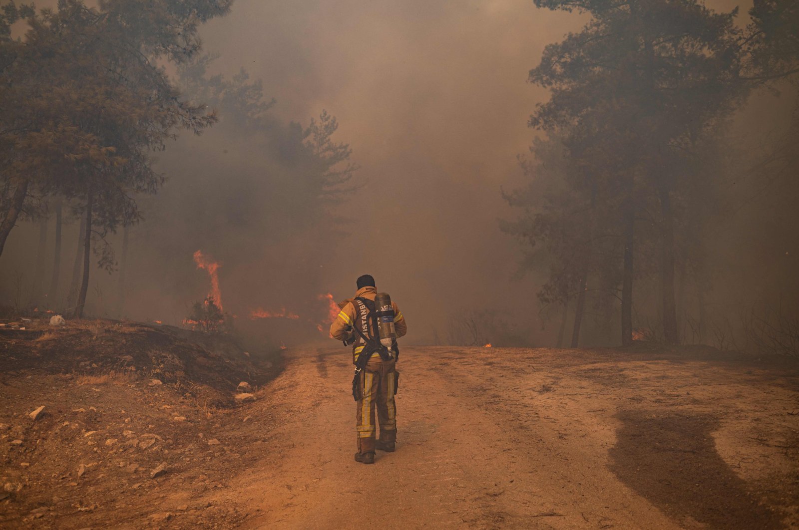 Firefighters battle a wildfire in Marmaris district of Muğla province, southwestern Turkey, Aug. 2, 2021. (AFP Photo)