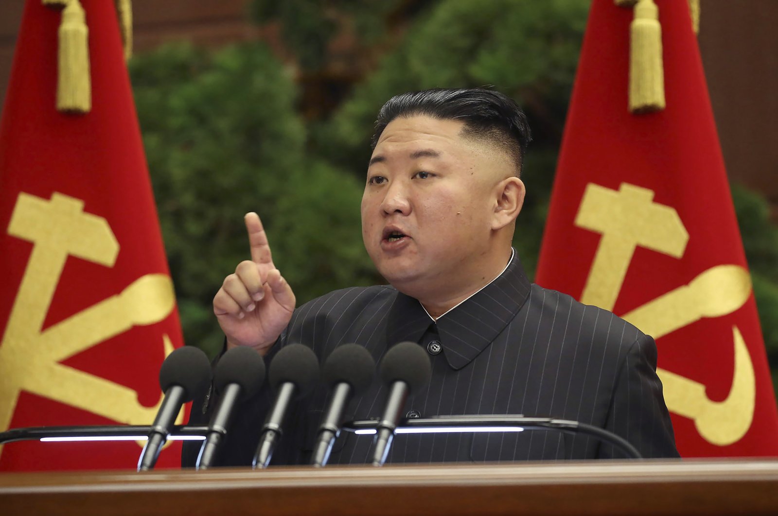 In this file photo provided by the North Korean government, North Korean leader Kim Jong Un speaks during a Politburo meeting of the ruling Workers' Party in Pyongyang, North Korea, June 29, 2021. (Korean Central News Agency/Korea News Service via AP Photo)