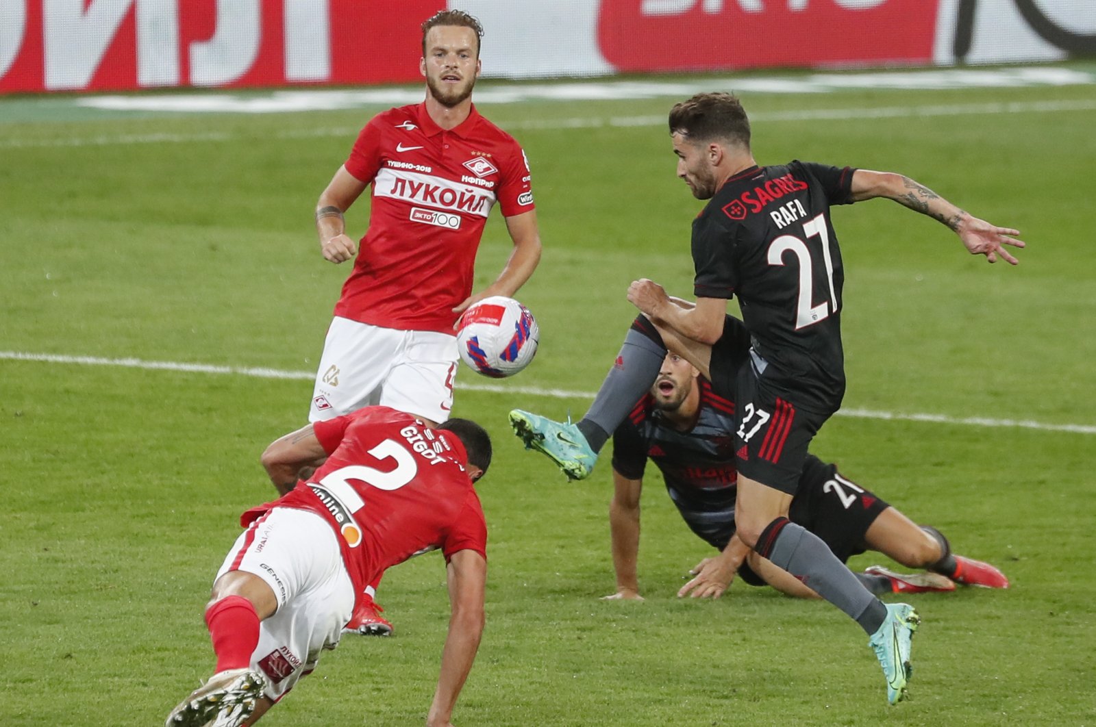 Benfica's Rafa Silva (R) in action against Spartak Moscow players during a UEFA Champions League qualifier match in Moscow, Russia, Aug. 4, 2021. (EPA Photo)
