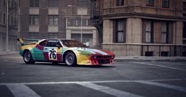 Just a colorful BMW? Art lovers will recognize a genuine Andy Warhol worth millions on this M1. Photo. (DPA Photo) 
