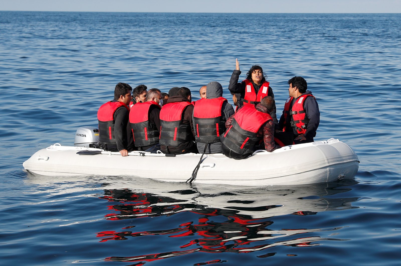 Migrants who launched from the coast of northern France cross the English Channel in an inflatable boat near Dover, U.K., Aug. 4, 2021. (Reuters Photo)
