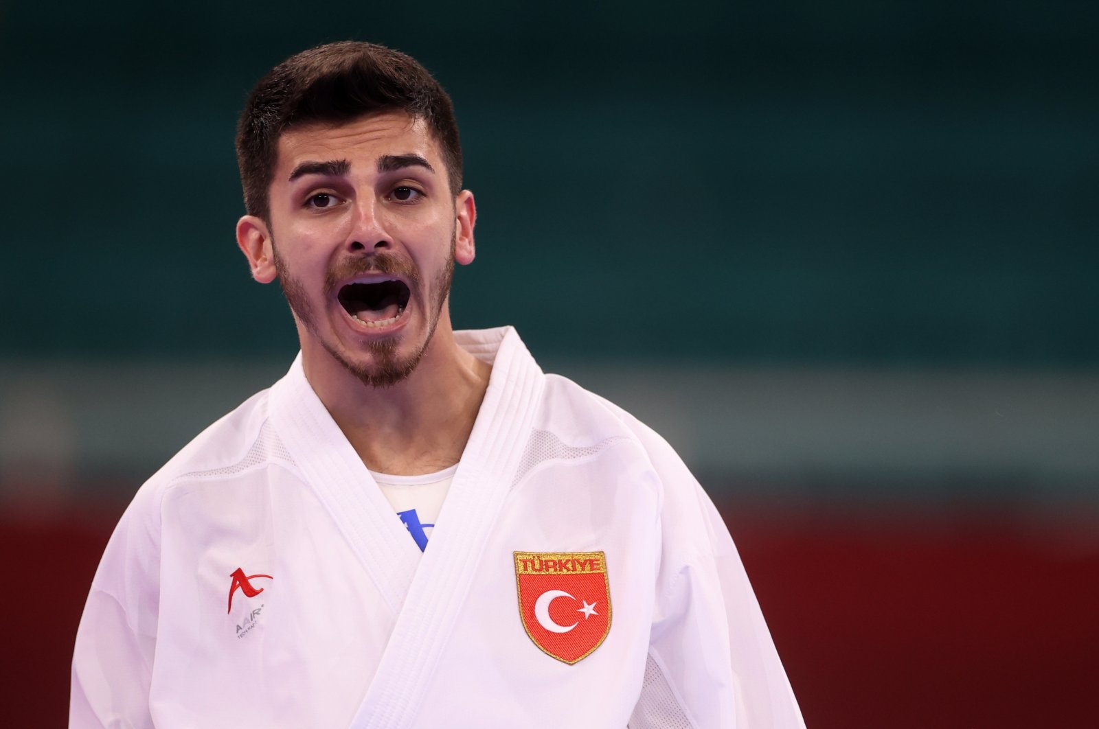 Turkey's Eray Şamdan reacts during the Tokyo 2020 67-kilogram kumite semifinal against Abdel Rahman Almasatfa of Jordan, Tokyo, Japan, Aug. 5, 2021. (Reuters Photo)