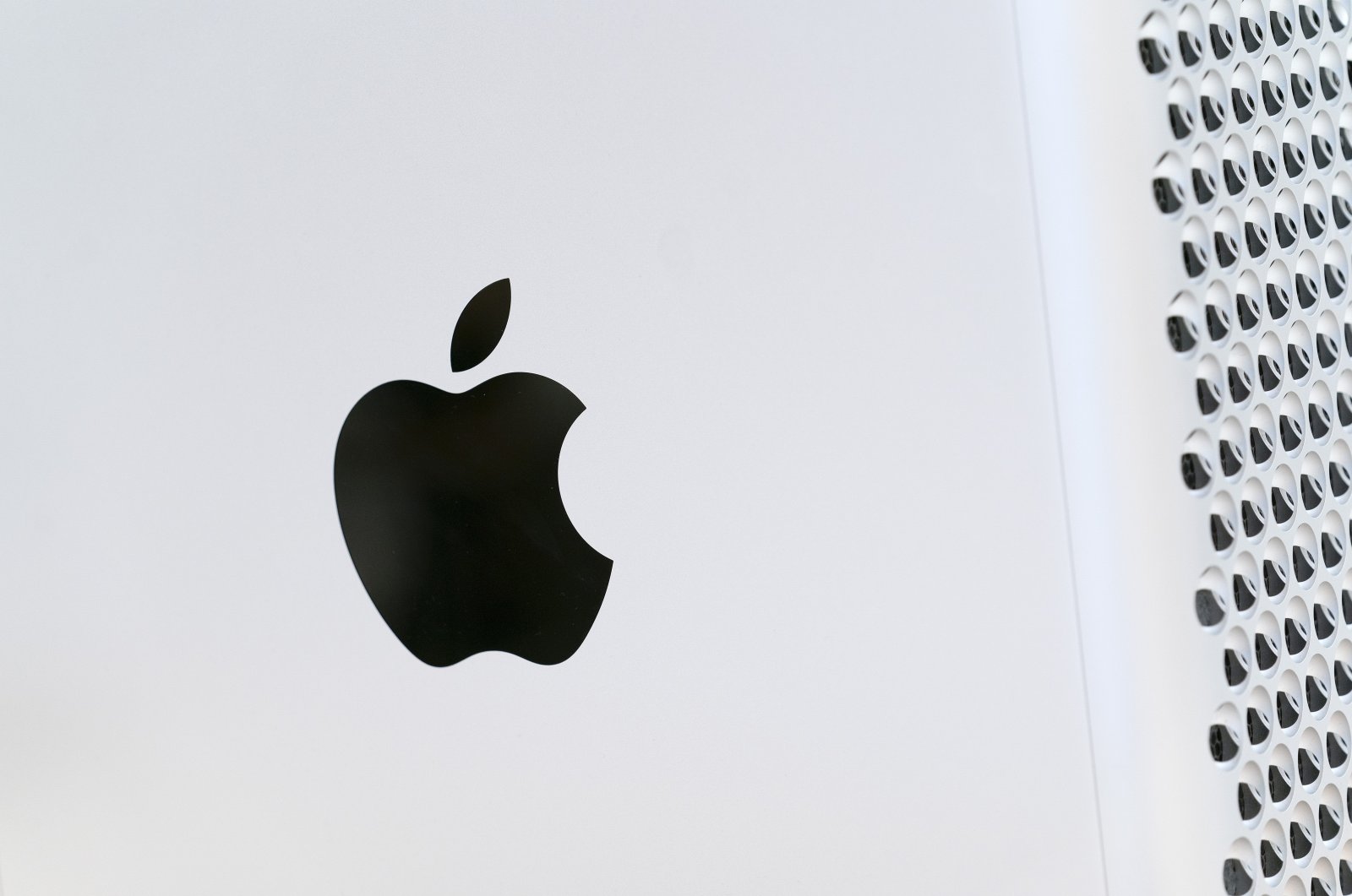 The Apple logo displayed on a Mac Pro desktop computer in New York. Apple is planning to scan U.S. iPhones for images of child abuse, drawing applause from child protection groups but raising concern among security researchers that the system could be misused by governments looking to surveil their citizens, May 21, 2021. (AP Photo)