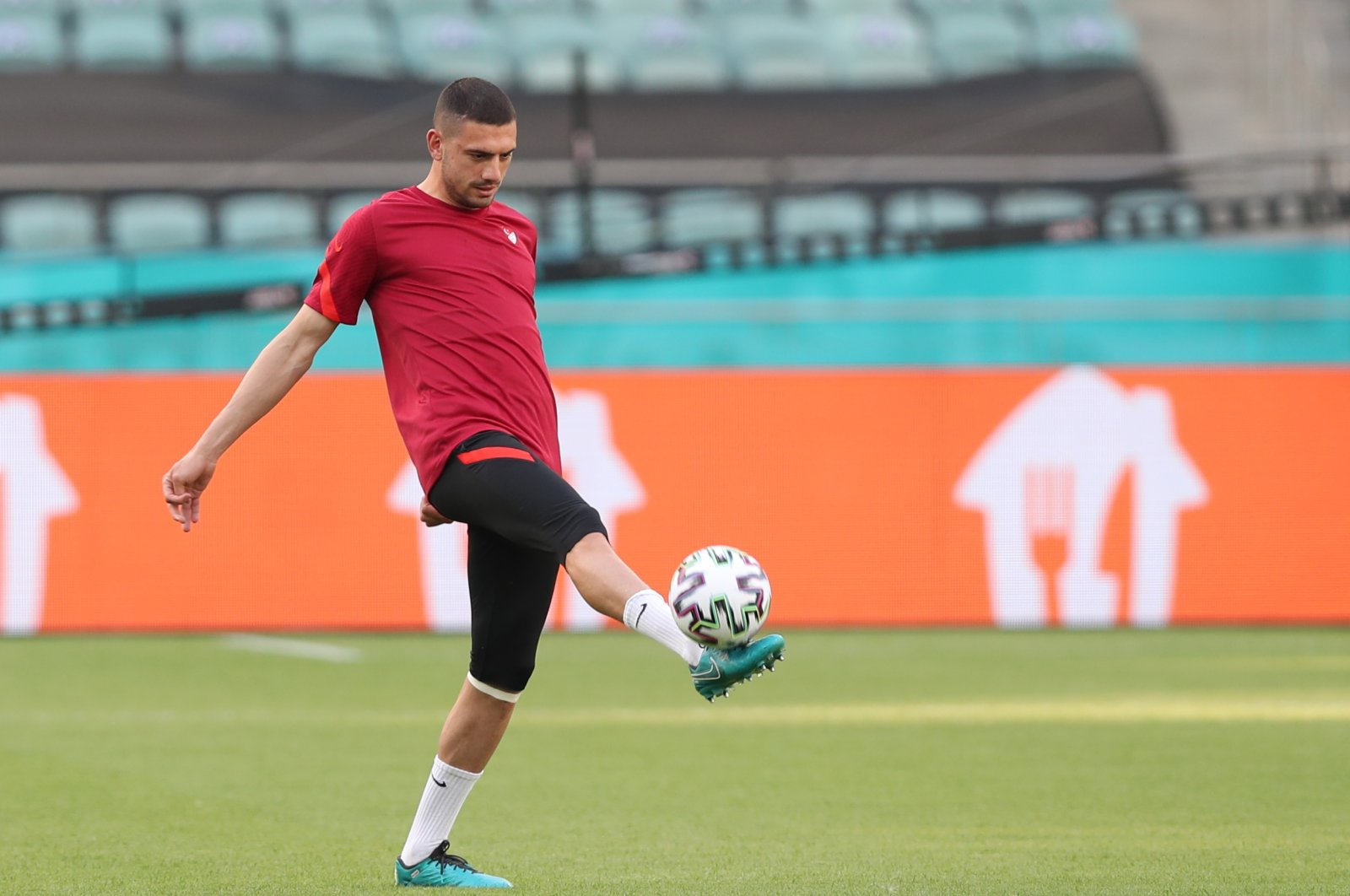 Merih Demiral of Turkey warms up during a training session during EURO 2020 in Baku, Azerbaijan, 15 June 2021. (EPA Photo)