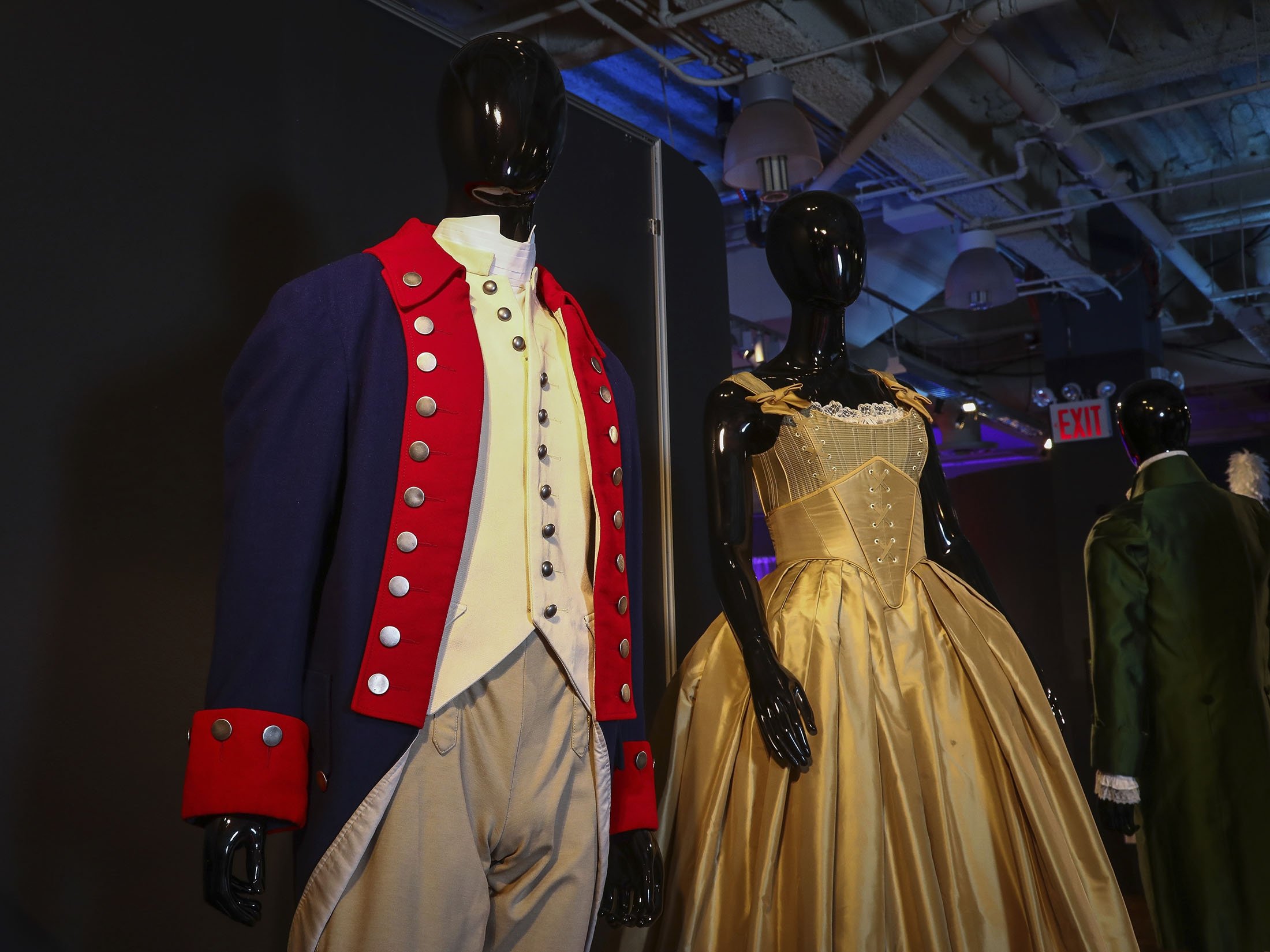 Costumes from the Broadway musical "Hamilton" are displayed at the "Showstoppers! Spectacular Costumes from Stage & Screen" exhibit in Times Square, New York, U.S., Aug. 2, 2021. (AP Photo)