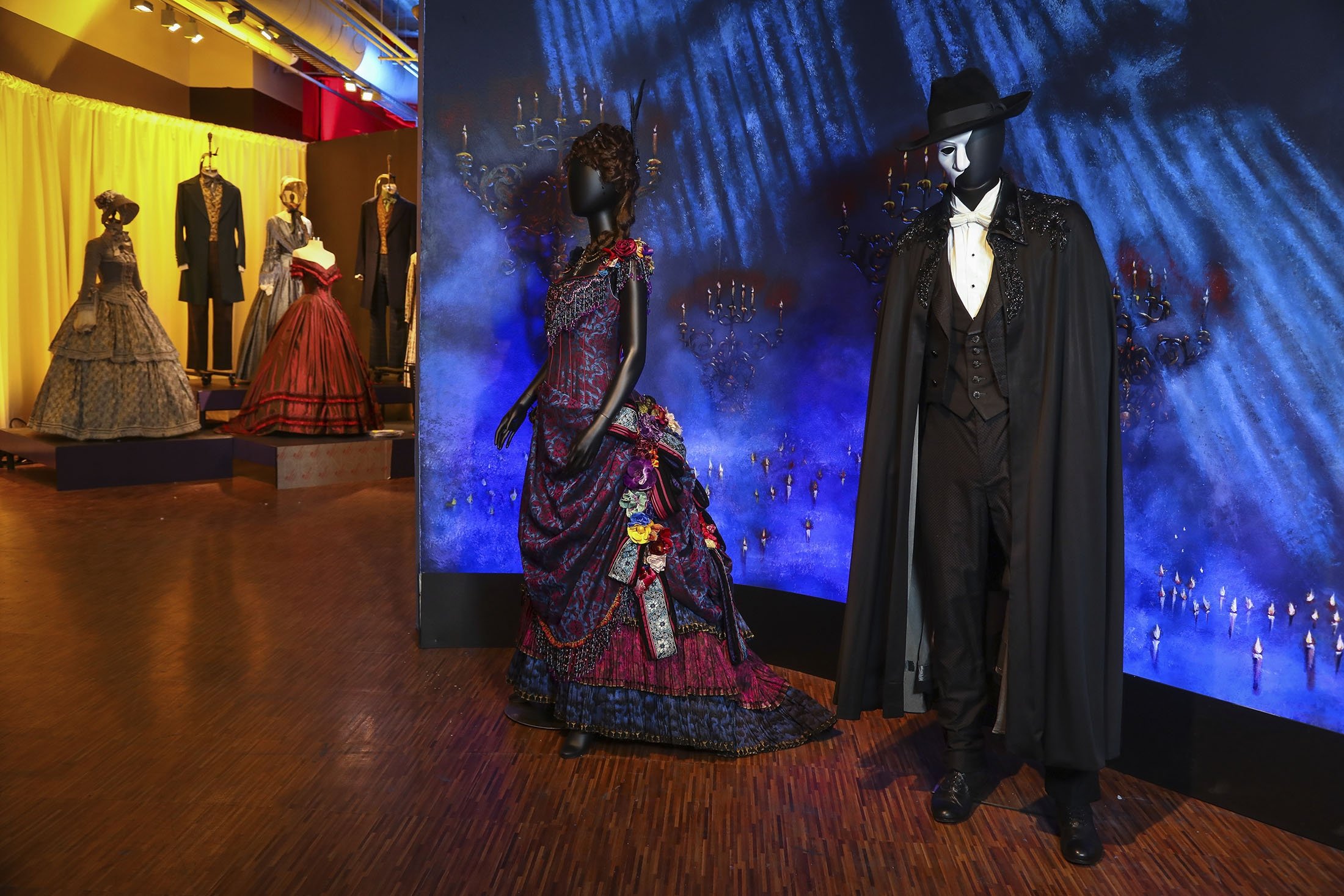 Costumes from the Broadway musical "The Phantom of the Opera" are displayed at the "Showstoppers! Spectacular Costumes from Stage & Screen" exhibit in Times Square, New York, U.S., Aug. 2, 2021. (AP Photo)