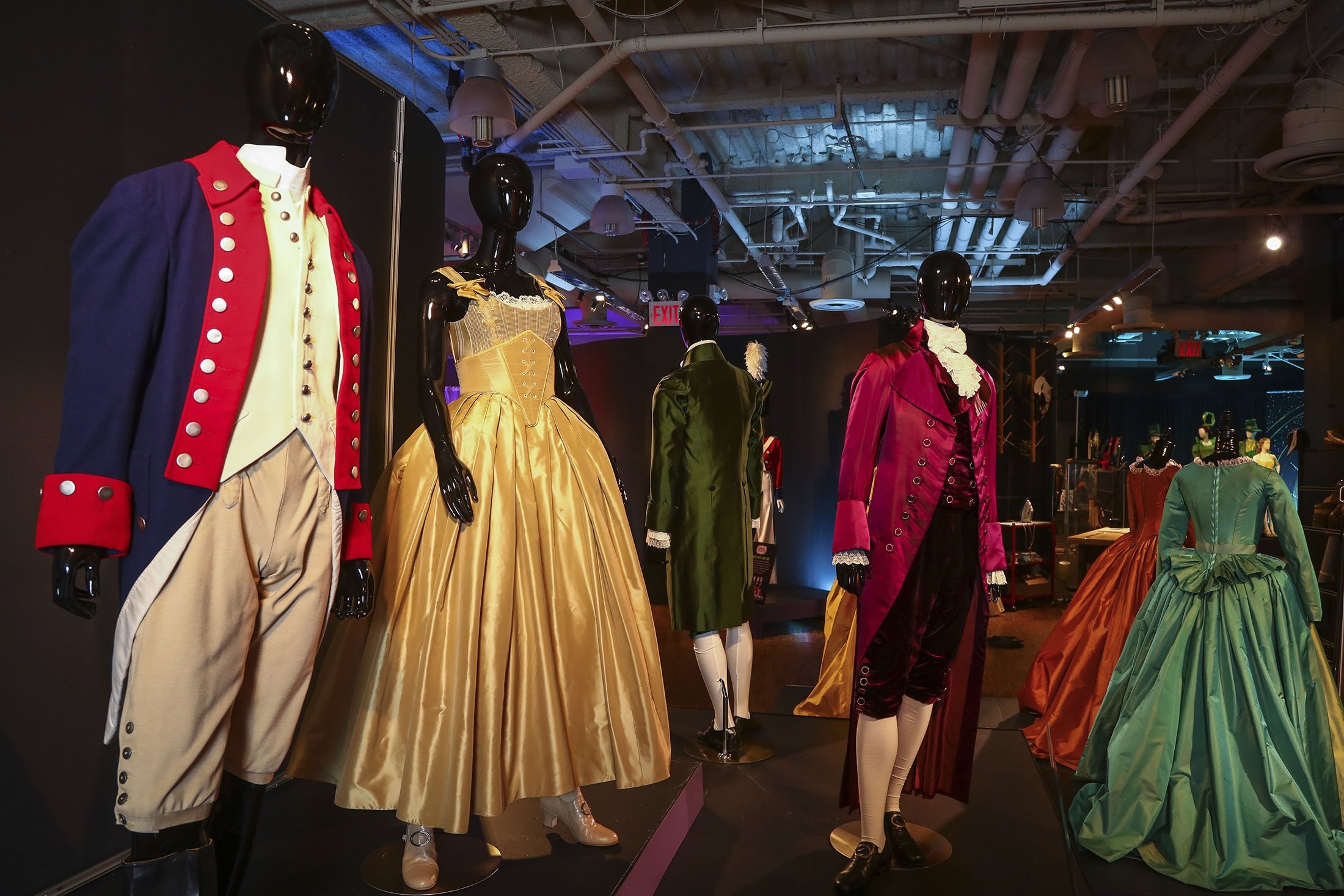 Costumes from the Broadway musical "Hamilton" are displayed at the "Showstoppers! Spectacular Costumes from Stage & Screen" exhibit in Times Square, New York, U.S., Aug. 2, 2021. (AP Photo)