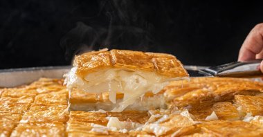 A tray of cheese-filled su börek. (Shutterstock Photo)