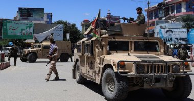 Afghan security forces sit in a Humvee vehicle amid ongoing fighting between Taliban militants and Afghan security forces in Kunduz, Afghanistan, May 19, 2020. (AFP File Photo)