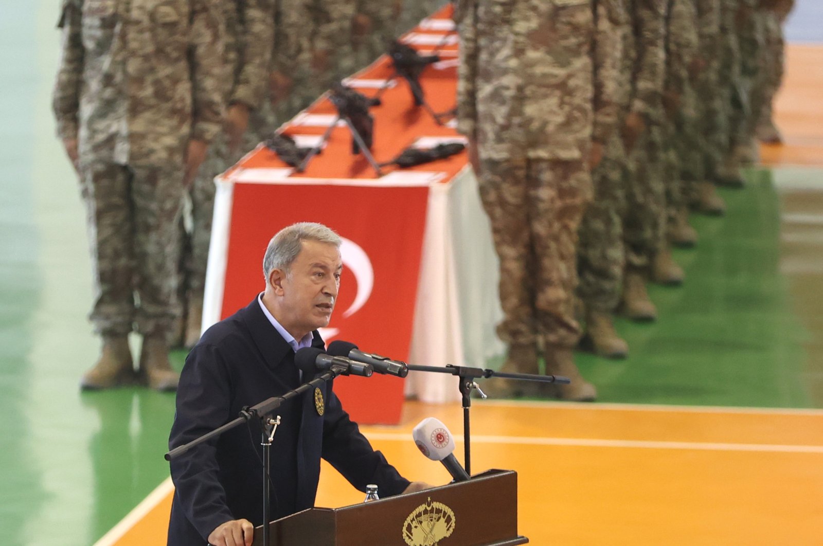 Defense Minister Hulusi Akar speaks at a swearing-in ceremony for Maroon Berets who successfully completed a 47-week special training program in Ankara, Turkey, Aug. 7, 2021. (AA Photo)