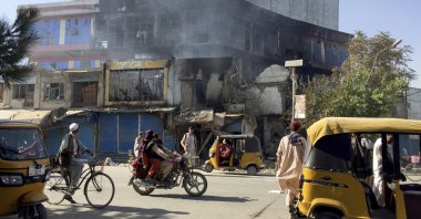 Shops are damaged after fighting between Taliban and Afghan security forces in the city of Kunduz, northern Afghanistan, Aug. 8, 2021. (AP Photo)