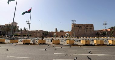 Pigeons fill the almost-empty Martyrs square a day after the authorities announced a total curfew throughout the weekend, to mitigate the spread of the COVID-19 pandemic, in the capital Tripoli, Libya, Aug. 7, 2021. (AFP Photo)