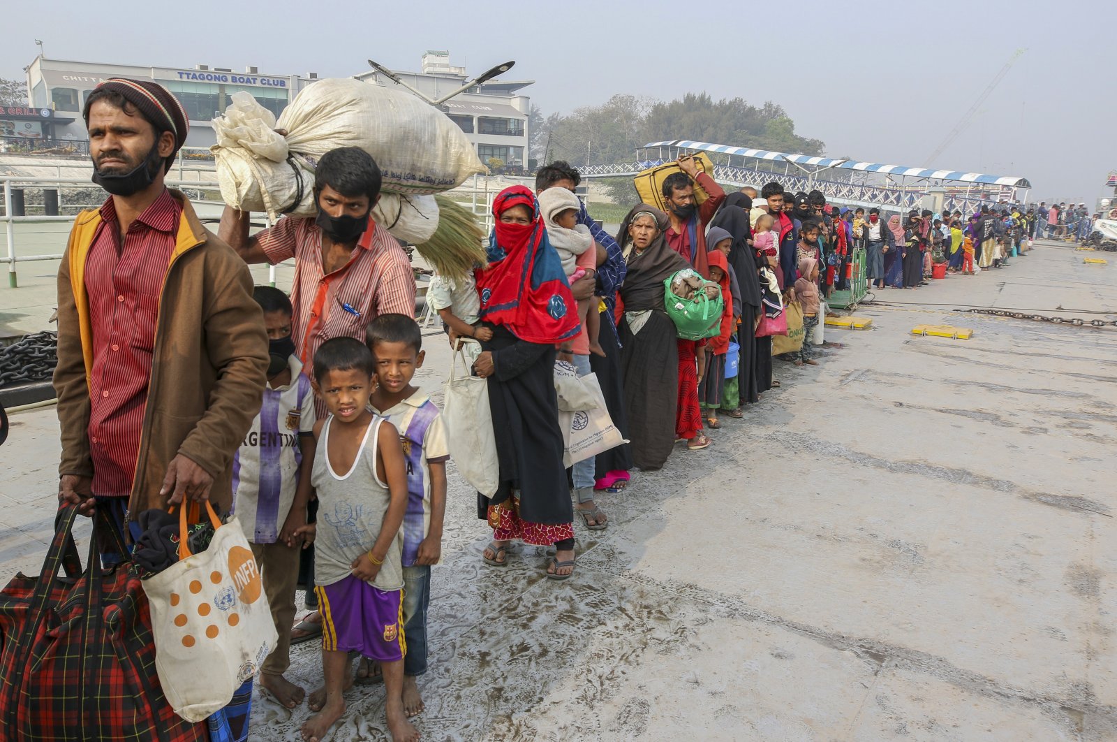 Rohingya refugees headed to the Bhasan Char island prepare to board navy vessels from the south eastern port city of Chattogram, Bangladesh, Feb. 15, 2021.  (AP Photo)