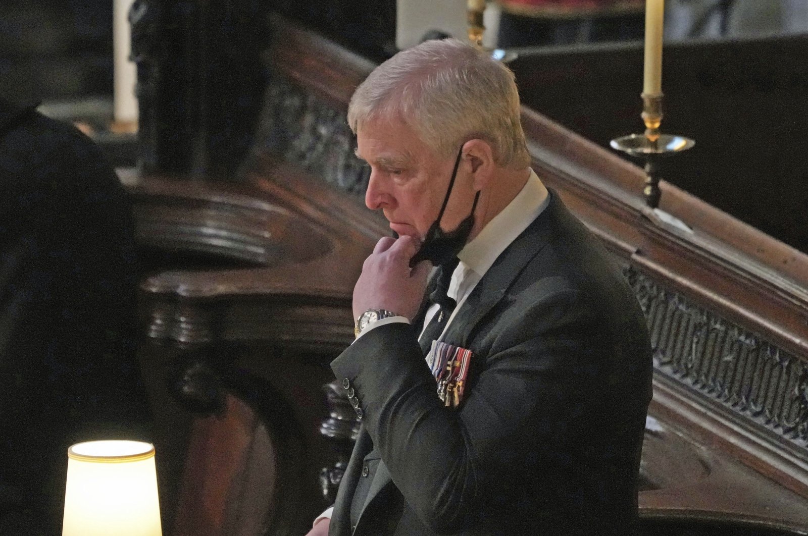 Britain's Prince Andrew stands inside St. George's Chapel during the funeral of his father, Prince Philip, at Windsor Castle, Windsor, England, April 17, 2021. (AP Photo)