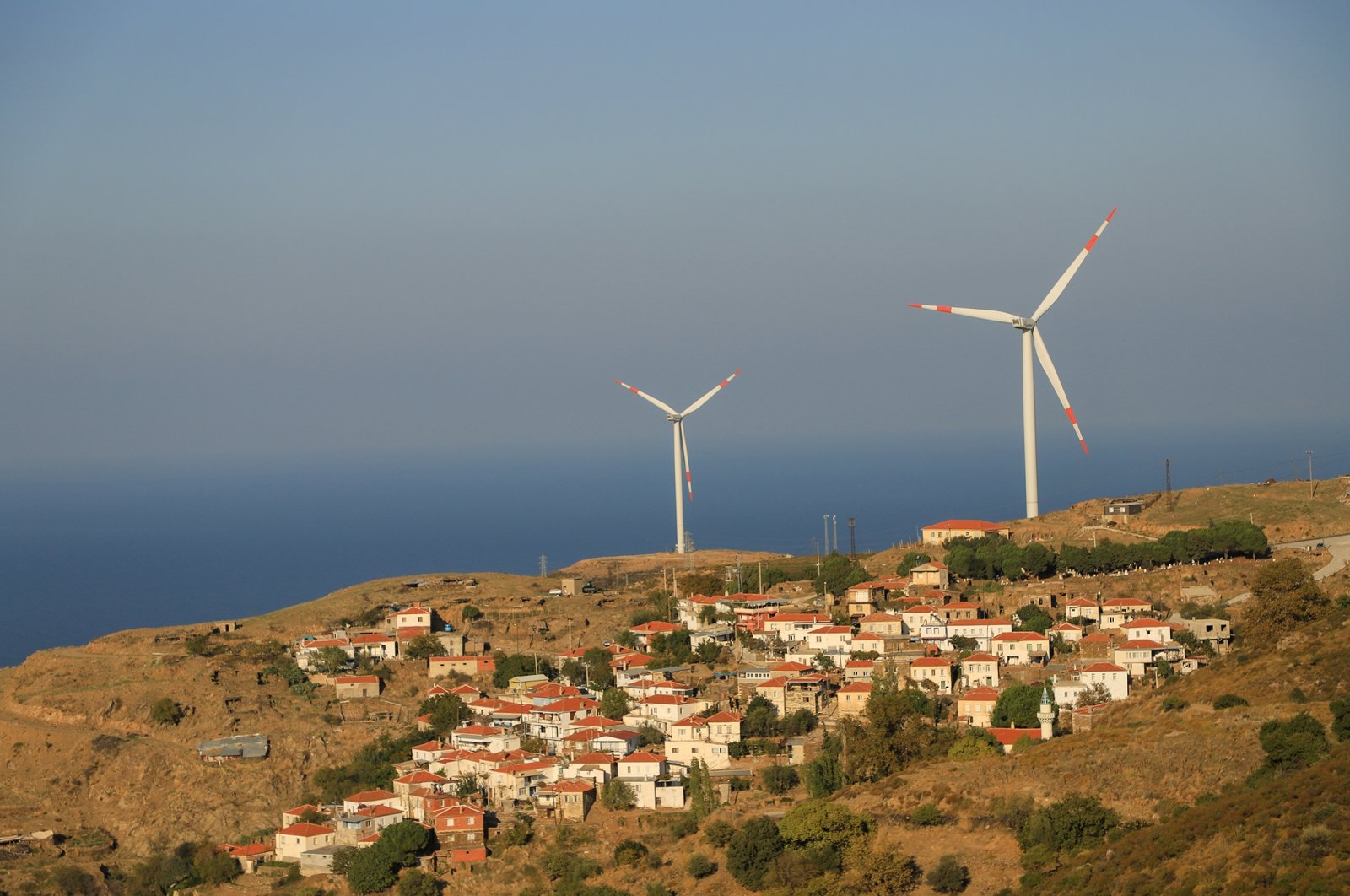 Wind turbines are seen in the Karaburun district of Turkey's Aegean province of Izmir, April 30, 2021. (Shutterstock Photo)