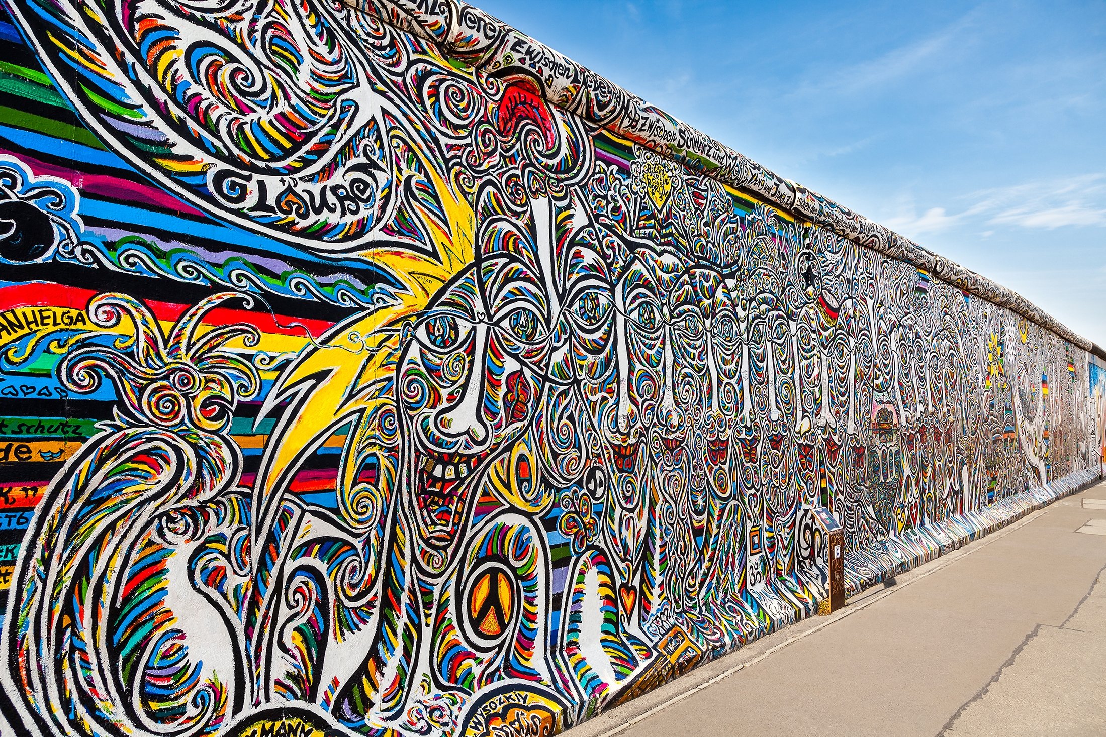 Graffiti can be seen on a part of the original Berlin Wall at East Side Gallery in Berlin, Germany, Sept. 15, 2014. (Shutterstock Photo)