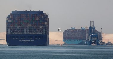 CMA CGM Louis Bleriot and a Maersk Line container ship pass through the Suez Canal in Ismailia, Egypt, July 7, 2021. (Reuters Photo)