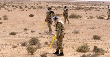 Members of the military engineering team dismantle mines in Abu Grein, Libya, March 13, 2021. (REUTERS Photo)