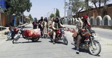 Taliban fighters patrol inside the city of Ghazni, southwest of Kabul, Afghanistan, Aug. 12, 2021. (AP Photo)