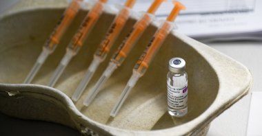 A vial and syringes of the AstraZeneca COVID-19 vaccine can be seen at the Guru Nanak Gurdwara Sikh temple, in Luton, U.K., March 21, 2021. (AP Photo)