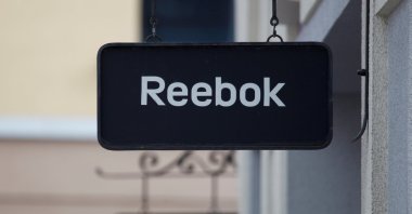 Signs with the Reebok store logo are seen at a shopping center at the outlet village Belaya Dacha outside Moscow, Russia, April 23, 2016. (Reuters Photo)