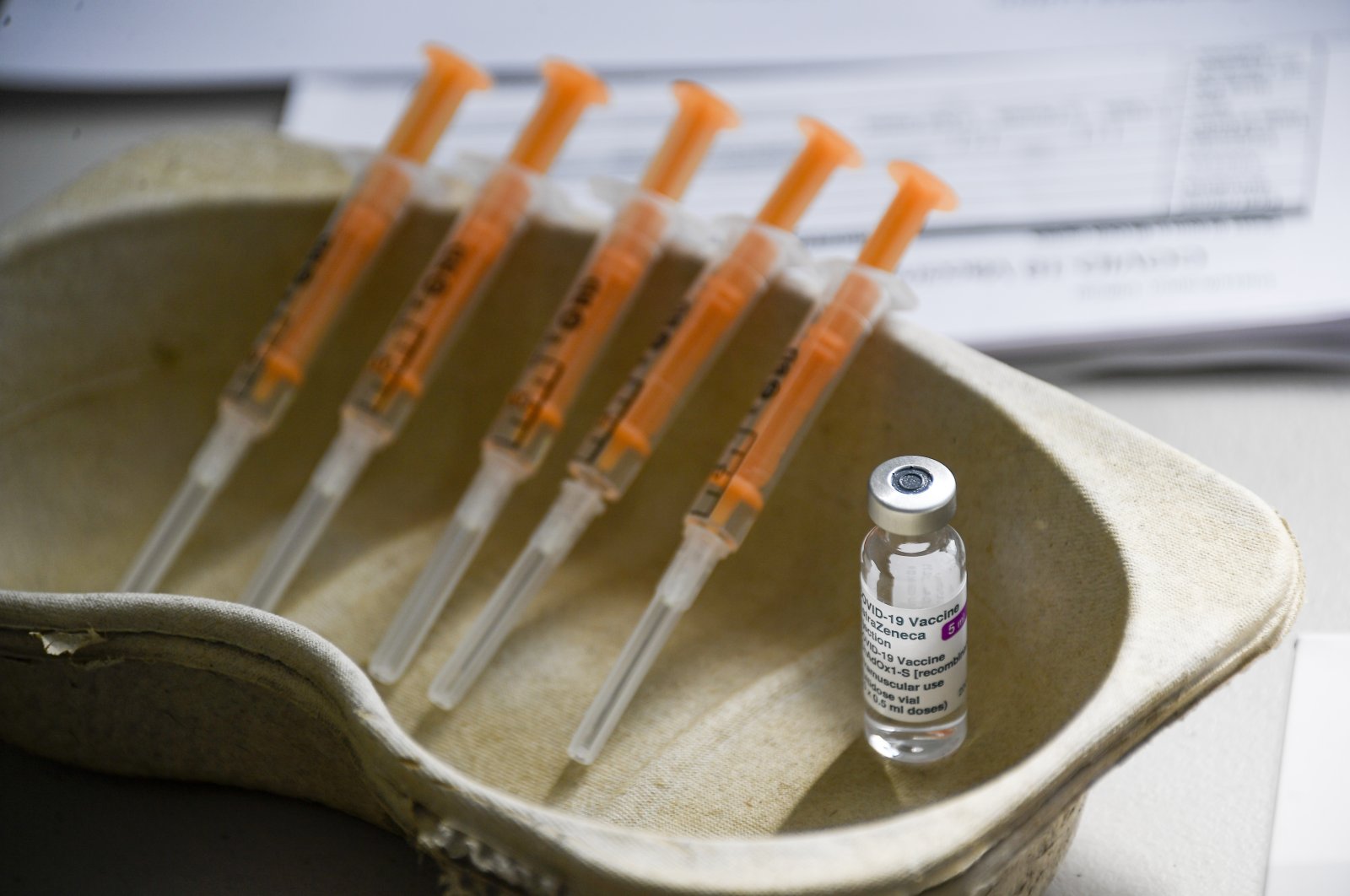 A vial and syringes of the AstraZeneca COVID-19 vaccine can be seen at the Guru Nanak Gurdwara Sikh temple, in Luton, U.K., March 21, 2021. (AP Photo)