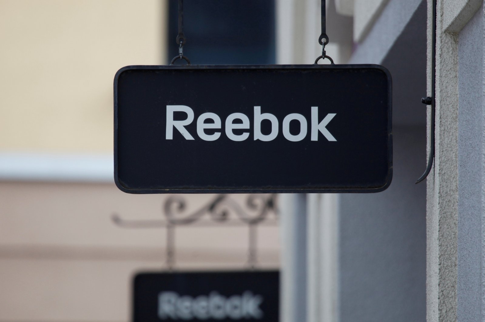 Signs with the Reebok store logo are seen at a shopping center at the outlet village Belaya Dacha outside Moscow, Russia, April 23, 2016. (Reuters Photo)
