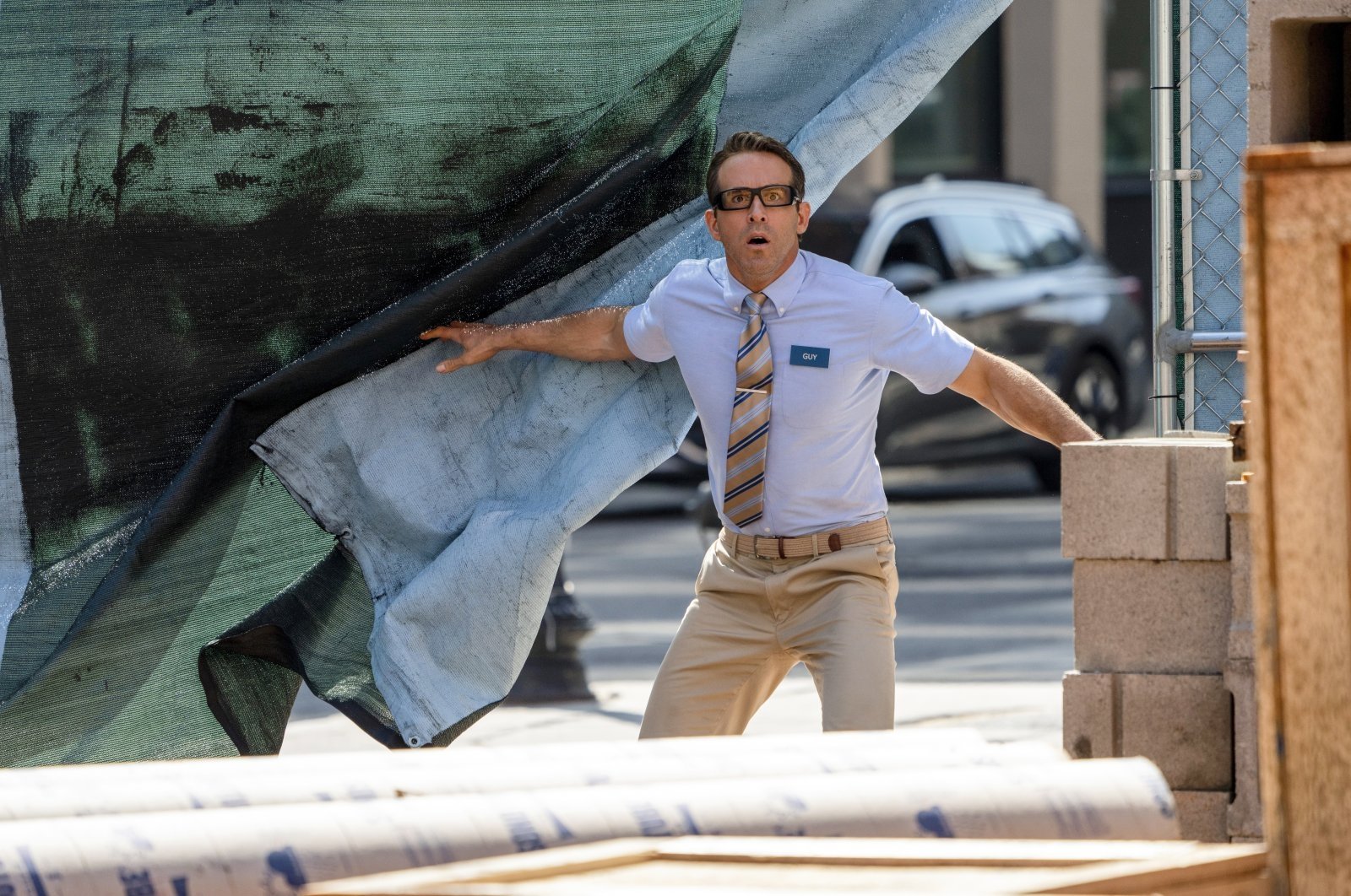 This image released by 20th Century Studios shows Ryan Reynolds in a scene from "Free Guy." (AP Photo)