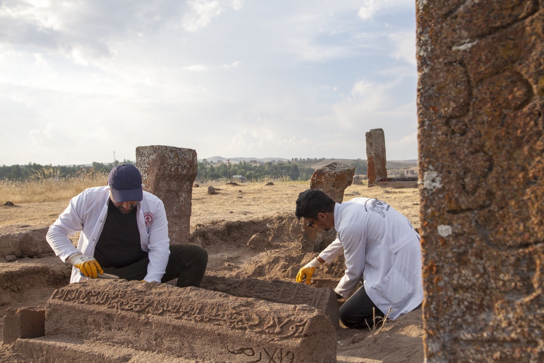 Members of the excavation team carry out archaeological work at unidentified Seljuk graves