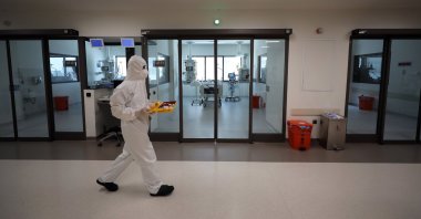 A health care worker walks at an intensive care ward for COVID-19 patients at a hospital, in the capital Ankara, Turkey, Aug. 13, 2021. (AA PHOTO)