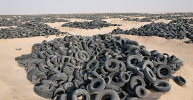 A tire graveyard with 50 million dumped tires poses environmental and health risks. (AA Photo)