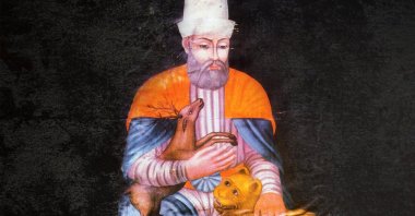 A general depiction of Haji Bektash Veli, holding a deer and a lion. 