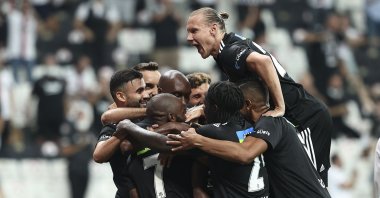 Beşiktaş club captain Atiba Hutchinson celebrates with his teammates after he scores the second goal for his team in a 3-0 win against Rizespor in the first match of the season at Vodafone Arena, Istanbul, Turkey, Aug. 13, 2021. (AA Photo)