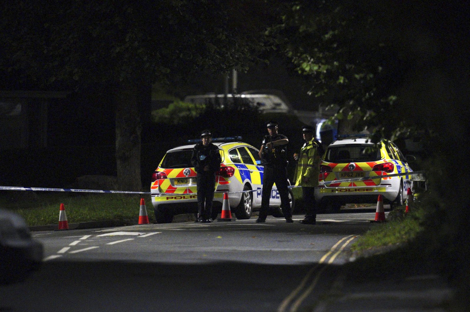Emergency services are seen near the scene of the shooting on Biddick Drive, in the Keyham area of Plymouth, southwest England, Aug. 12, 2021. (AP Photo)