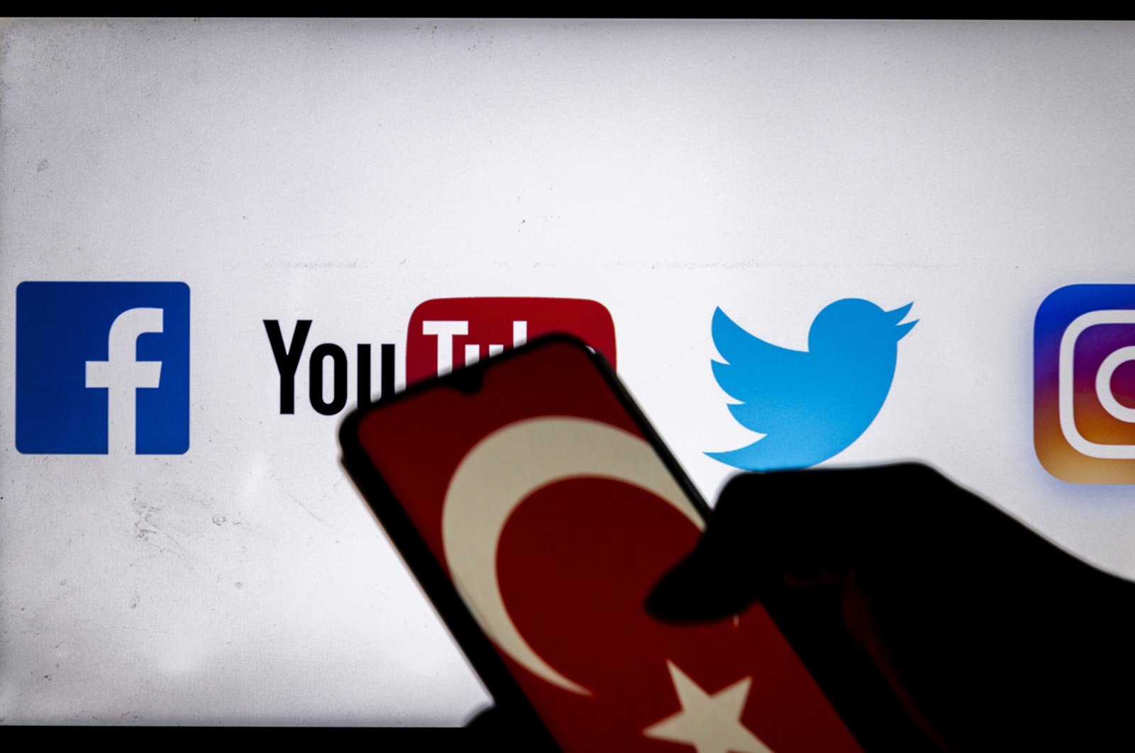 A Turkish flag is seen displayed on a smartphone with social media applications in the background, Dec. 25, 2020. (Getty Images)