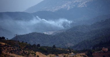 Smoke rises during a forest fire in Onikuşubat district, Kahramanmaraş province, Turkey, Aug. 13, 2021. (AA Photo)