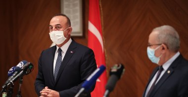 Foreign Minister Mevlüt Çavuşoğlu (L) speaks at a joint press conference with his Algerian counterpart Ramtane Lamamra in Algeria, Aug. 14, 2021. (AA Photo)