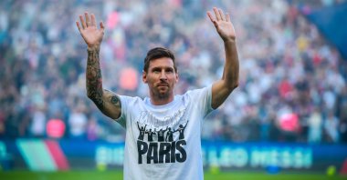Paris Saint-Germain's Lionel Messi greets fans during the presentation of the new recruits prior to the French Ligue 1 match against Strasbourg at the Parc des Princes stadium, Paris, France, Aug. 14, 2021. (EPA Photo)