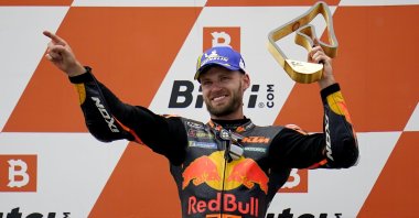 South Africa's Brad Binder celebrates winning the Austrian motorcycle Grand Prix at the Red Bull Ring in Spielberg, Austria, Aug. 15, 2021. (AP Photo)